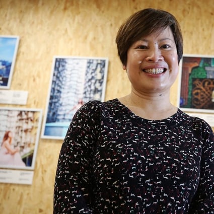 RainLily executive director Linda Wong at an exhibition of sexual abuse survivors’ portraits in Yau Ma Tei. Photo: Winson Wong