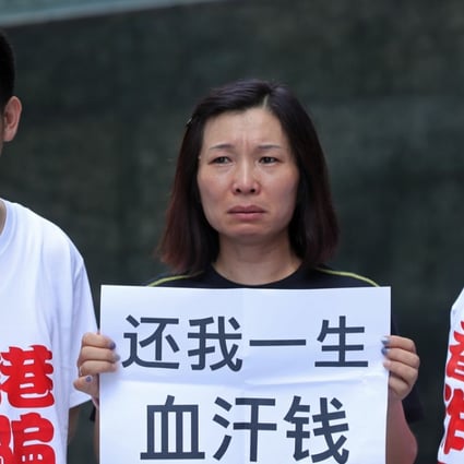 Mainland investors complain to Hong Kong’s Securities and Futures Commission and the Hong Kong Monetary Authority as they lost all money after being lured into buying financial products worth US$10 billion through a Hong Kong broker.24 June 2016. Photo: SCMP/ Edward Wong