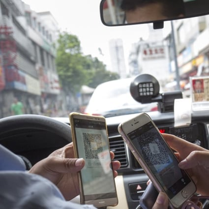 Rapid growth in mobile applications has led to a surge in phone usage and the need for supplementary battery power among users in China. Photo: May Tse