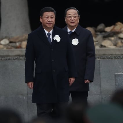 Chinese President Xi Jinping (left) and Chinese People's Political Consultative Conference chairman Yu Zhengsheng attend commemorations in Nanjing on Wednesday, the 80th anniversary of the Nanking massacre. Photo: EPA