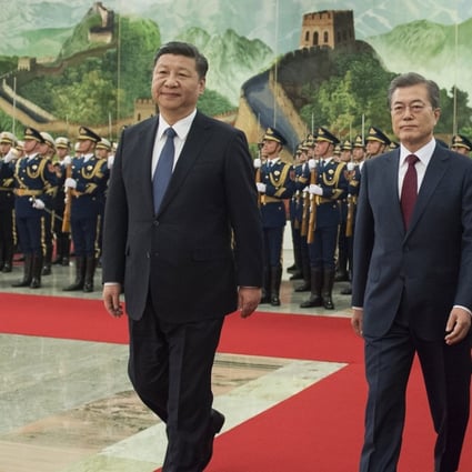 Xi Jinping welcomes his South Korean counterpart Moon Jae-In to the Great Hall of the People on Thursday. Photo: EPA-EFE