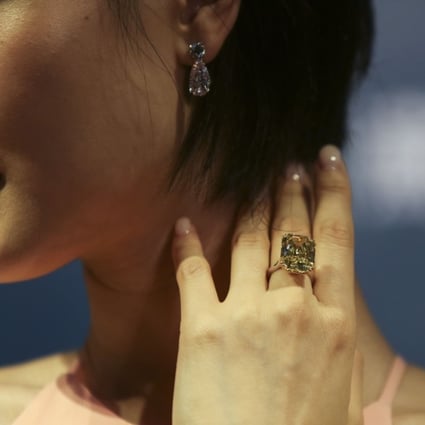 An important fancy vivid yellow diamond ring shown at Sotheby's Hong Kong Magnificent Jewels and Jadeite Autumn Sale. Photo: SCMP / Xiaomei Chen