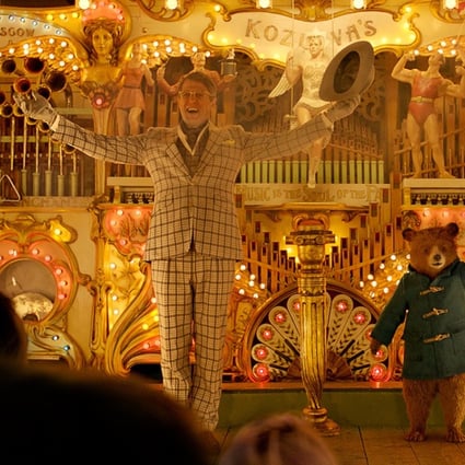 Hugh Grant and Paddington, the lovable Peruvian bear, in Paddington 2 (category: I), directed by Paul King.