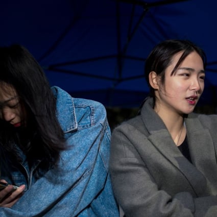 Jiang Mengna (right) live broadcasts during a break at the Yiwu Industrial & Commercial College in Yiwu, Zhejiang Province. Monthly active viewers of live streaming with an entertainment element have been in decline since December 2016. Photo: AFP
