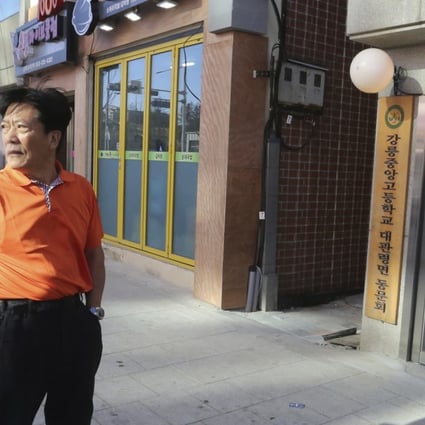 Choi Jong-sik, 64, stands in front of his restaurant in Pyeongchang, South Korea. After two straight balmy Olympics where some might have wondered if it was even winter, let alone the world’s pre-eminent freeze-dependent sporting event, athletes and visitors alike will finally experience a no-joke chill in their bones in Pyeongchang. Photo: AP