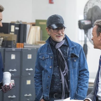 Meryl Streep, director Steven Spielberg, and Tom Hanks discuss a scene on the set of The Post. Photo: AP