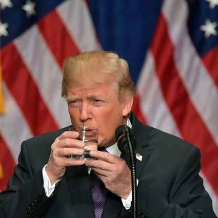 US President Donald Trump takes a drink of water as he speaks about his administration's National Security Strategy at the Ronald Reagan Building and International Trade Center in Washington, DC, December 18, 2017. Photo: Agence France-Presse