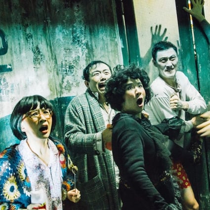 Sandra Ng (third from left) leads a group of characters to fend off a zombie attack in a still from Goldbuster (IIB, Cantonese), directed by Sandra Ng.