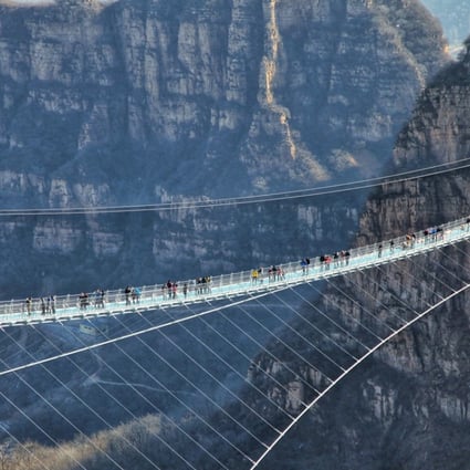 The glass suspension bridge at Hongyagu Scenic Area in Pingshan county, Hebei province. Photo: Xinhua