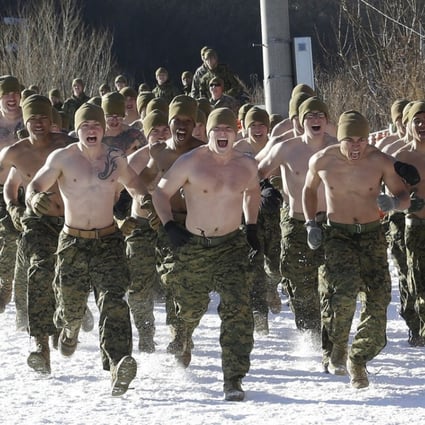 US Marines run at a joint military winter exercise with South Korean marines in Pyeongchang, South Korea. Photo: AP