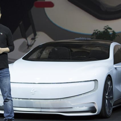 Jia Yueting, co-founder of LeEco, seen unveiling an all-electric battery concept car during a ceremony in Beijing on April 20, 2016. Photo: Handout