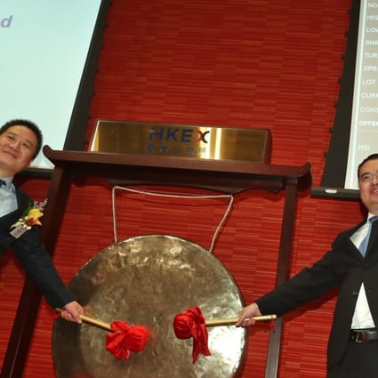 China Literature co-chief executive officers Liang Xiaodong (left) and Wu Wenhui attend the company’s listing ceremony at Hong Kong stock exchange on November 8. Photo: Nora Tam