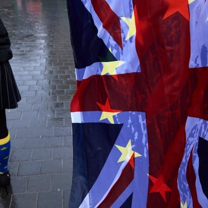 A pro-EU anti-Brexit demonstrator rallies outside the Houses of Parliament in central London on December 13. British Prime Minister Theresa May’s imperial vision of a Britain trading on its own terms with everyone is 150 years out of date. Photo: AFP