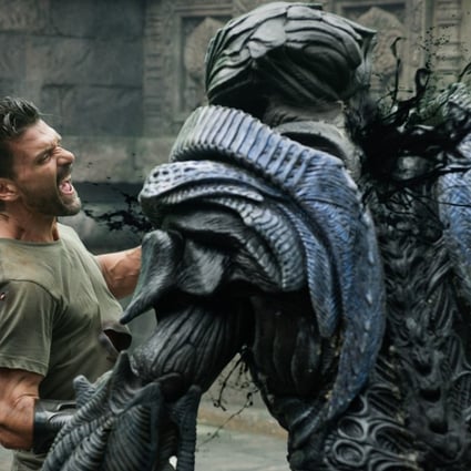 Frank Grillo fights an alien in a scene from Beyond Skyline (category IIB; English, Bahasa Indonesia). The film, directed by Liam O’Donnell, co-stars Iko Uwais and Bojana Novakovic.
