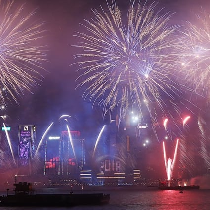 FIreworks go off over Victoria Harbour to ring in the new year in Hong Kong. The city was the most popular overseas destination among Chinese travellers. Photo: Edward Wong