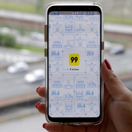 The 99 app. The acquisition intensifies Didi’s global rivalry with Uber. Photo: Reuters
