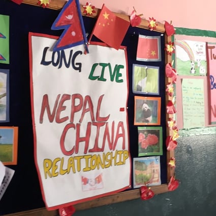 A poster on a message board outside the Confucius Classroom at the Learning Realm International School in Kathmandu promotes friendship between China and Nepal. Photo: Sarah Zheng