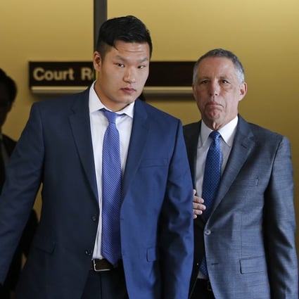 Raymond Lam (centre, seen in May last year) has pleaded guilty to voluntary manslaughter in the death of Michael Chun Deng, a fraternity pledge at Baruch College in New York. Deng died during a hazing ritual at a home in Pennsylvania that was rented by his fraternity, Pi Delta Psi. On Monday he was sentenced to 10-24 months in jail. File photo: AP