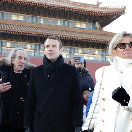 French President Emmanuel Macron (centre) and his wife Brigitte pictured on Tuesday during their visit to the Forbidden City, the former imperial palace in the centre of Beijing. Photo: Associated Press