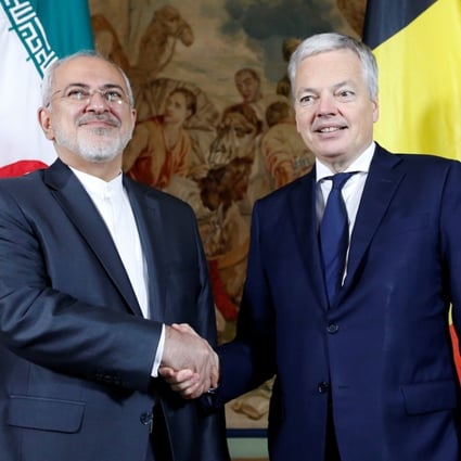 Belgian Foreign Minister Didier Reynders with his Iranian counterpart, Mohammad Javad Zarif. Photo: Reuters