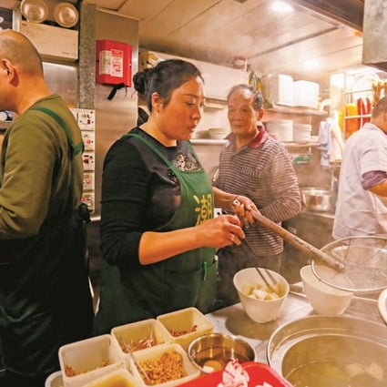 Chiu Chow Delicacies staff (from left) Li Wei Huang, Peng Bing, Lam Shek-hing and Ma Zhen Ting work in the restaurant’s kitchen in North Point. Photo: Xiaomei Chen