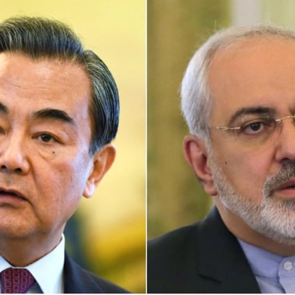 China’s Foreign Minister Wang Yi (left) told Iranian Foreign Minister Mohammad Javad Zarif that implementation of the nuclear deal had not been “derailed” but would face “some new complicating factors”. Photo: AFP