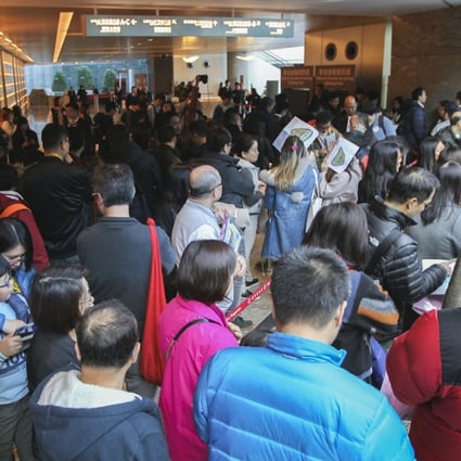 Hundreds of buyers queue for the launch of St Barths on January 13, a project by Sun Hung Kai Properties, reflecting the first residential project sale of 2018. Photo: Roy Issa
