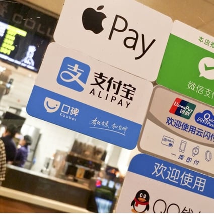The rapid development of fintech in China means 11 times more mobile payments are processed than in the United States every year. But the regulatory environment still contains uncertainties. Photo: ImagineChina