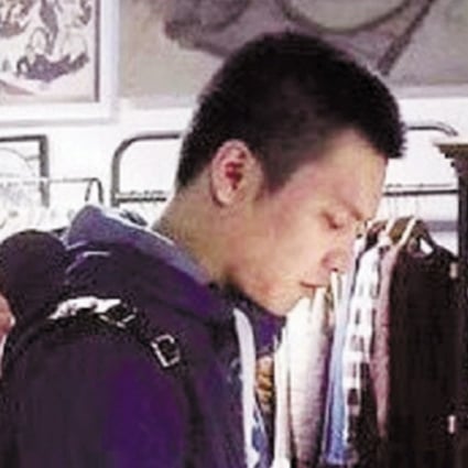 The police officer, Wang Haobin, who carried out the rescue. Photo: Qjwb.zjol.com.cn