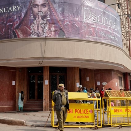 Security personnel stand guard outside a theatre after the release of Bollywood movie ‘Padmaavat’ in New Delhi, India, on January 25, 2018. Photo: Reuters