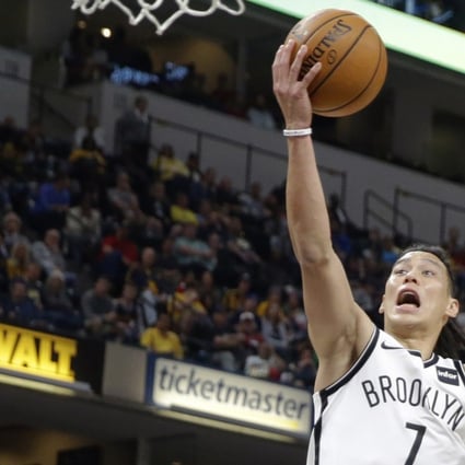Brooklyn Nets guard Jeremy Lin shoots over Indiana Pacers forward Thaddeus Young. Photo: AP