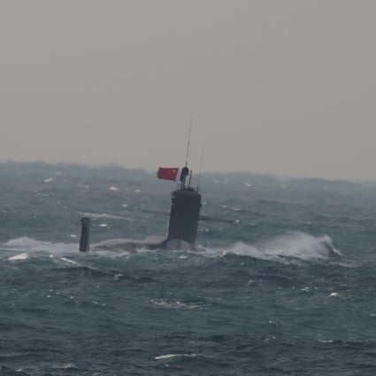 The nuclear attack submarine is seen flying a Chinese flag on its mast in the East China Sea on January 12 in a photo released by Japan’s defence ministry. Photo: Reuters