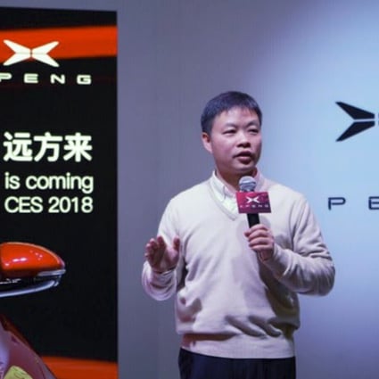 He Xiaopeng, co-founder and chairman of Xiaopeng Motors, unveils the company's first production car at the CES trade show in Las Vegas earlier this month. Photo: Handout