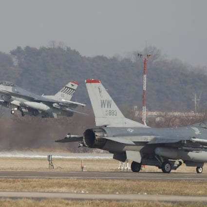 US Air Force F-16 fighter jets take part in a joint aerial drills called 'Vigilant Ace' between the US and South Korea at the Osan Air Base in Pyeongtaek on December 6, 2017. Photo: AFP