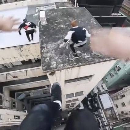 A still from a video released by the Storror parkour collective shows members leaping across rooftops in Tsim Sha Tsui, Hong Kong. Photo: courtesy of Facebook
