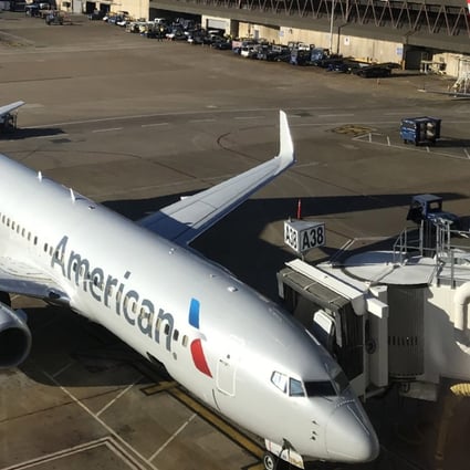 File photo taken on October 17, 2017 of an American Airlines plane at the gate of Dallas Fort Worth (DFW) International Airport. Photo: AFP