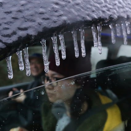 Ice is seen on a car at Tai Mo Shan in 2016. Photo: Felix Wong