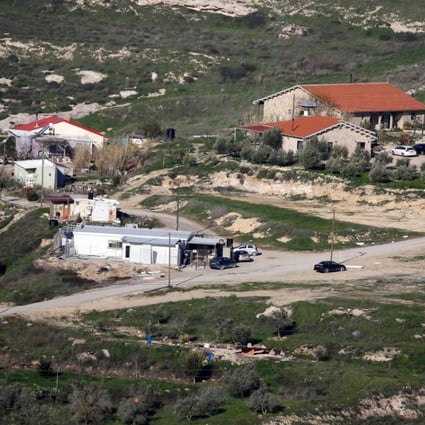A picture taken from the outskirts of the Palestinian city of Nablus shows a view of the “wildcat” Jewish settlement outpost of Havat Gilad. Photo: AFP