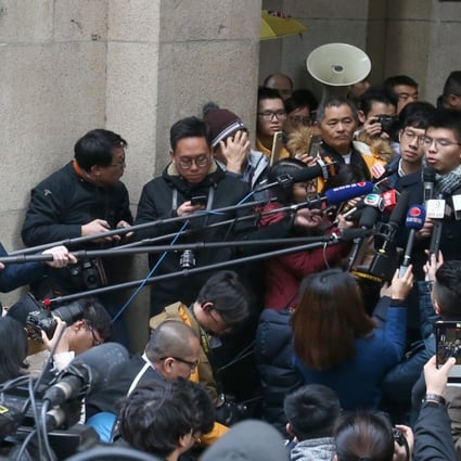 Nathan Law, Joshua Wong and Alex Chow meet the media outside the Court of Final Appeal. Photo: David Wong
