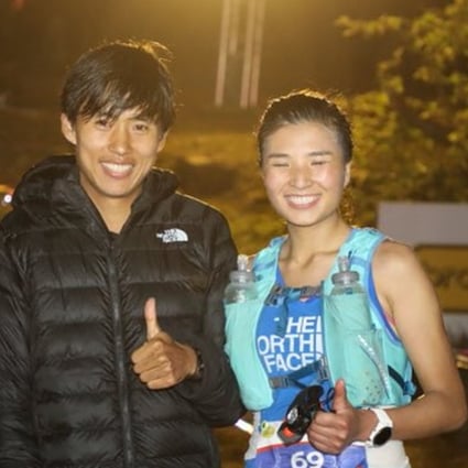 Qi Min and Yao Miao at the finish line of the HK100. Photo: Twitter/@iRunFar