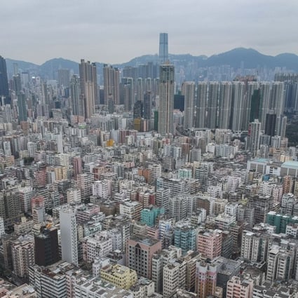 New residential buildings rise in the Tai Kok Tsui district (background) of the Kowloon peninsula. Photo: Roy Issa