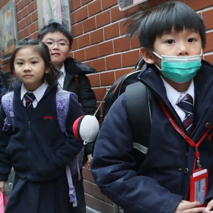 Children outside Hennessy Road Government Primary School in Wan Chai. Photo: Edward Wong