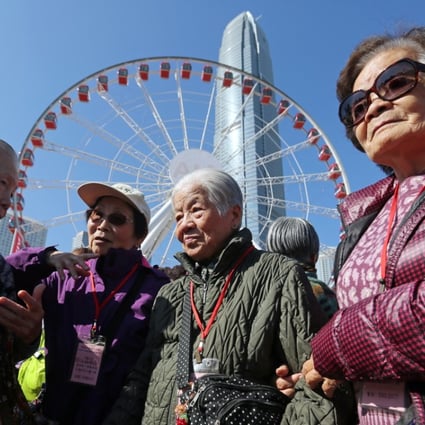 (Left to right) Chiu Wai-chan, Choi Sau-ming, Chow Fuk-far, and Li Au-ying get ready for a ride at the Observation Wheel in Central in December. Social relationships are important to keep us mentally healthy. Photo: Xiaomei Chen