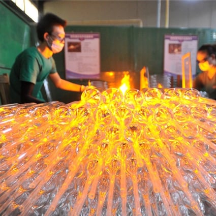 Beijing has banned capacity expansion in the glassmaking and cement industries this year. Photo: Xinhua