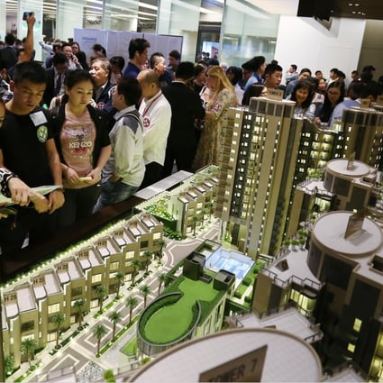Potential buyers visit the sales office for a residential development in Kwun Tong. Photo: Jonathan Wong