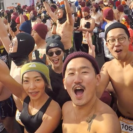 Competitors including the ‘Three Idiot Boys’ (front) take to the freezing Pyeongchang streets for the ‘Naked Marathon’. Photos: Handout
