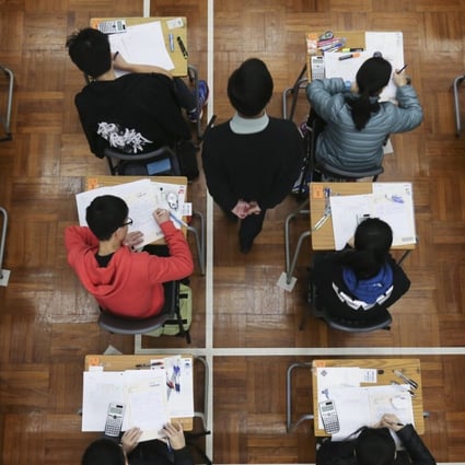 Students sit the Hong Kong Diploma of Secondary Education examination. Girls outperformed boys by 16 percentage points in meeting the minimum entry requirements for university. Photo: Dickson Lee