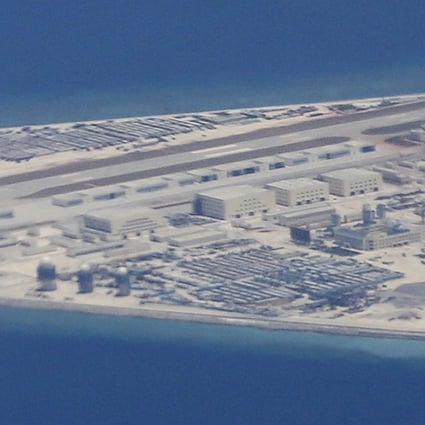An airstrip, structures and buildings are seen in this file photo of China’s man-made Subi Reef in the Spratly Islands in the South China Sea. A US naval commander said Beijing has built seven military bases in the disputed waterway. Photo: AP