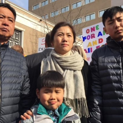 Huang Zhelong (far left) and his wife Li Xiangjin with their two sons. Photo: Weibo.