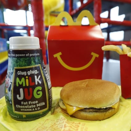 A Happy Meal featuring non-fat chocolate milk and a cheeseburger with fries. File photo: AP